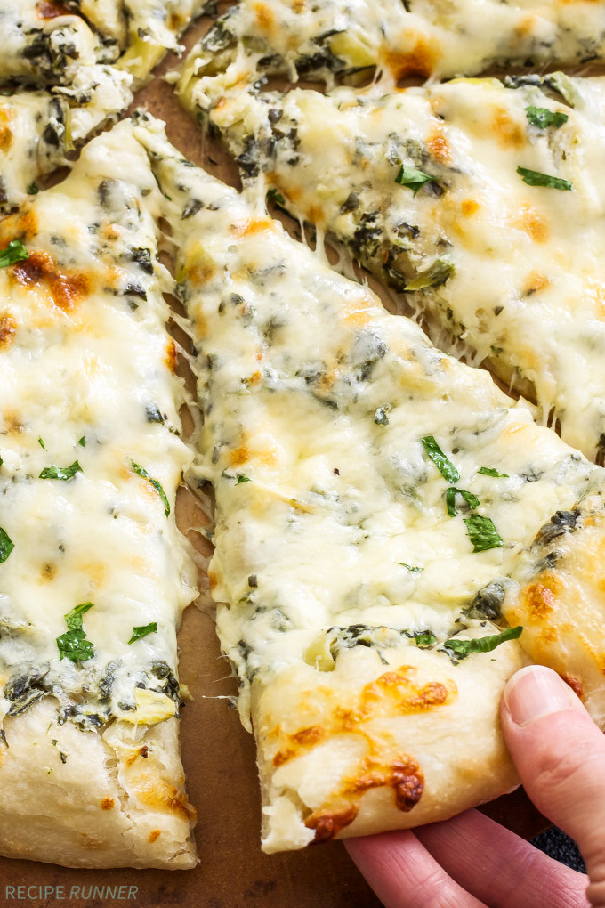 Spinach and Artichoke Dip Pizza | Get your appetizer and dinner all in one when you make this Spinach and Artichoke Dip Pizza!