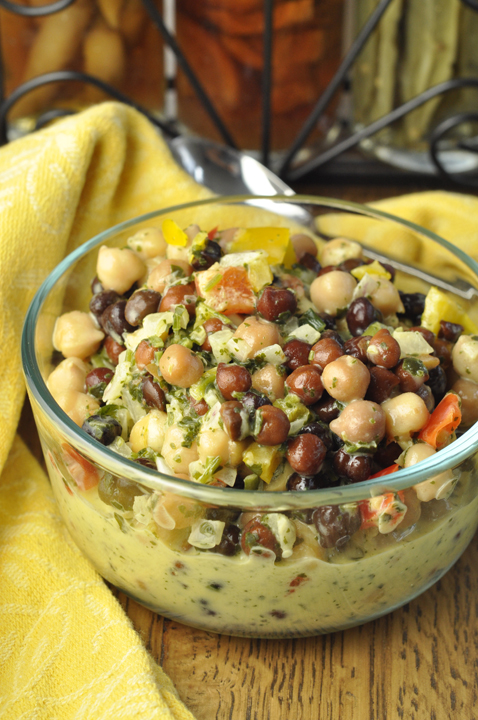 Summer Chickpea Black Bean Salad recipe that is low in fat and high in protein and makes an amazing side dish for your summer picnics or BBQ! You could also serve this alone or pair it with a toasted baguette or bread to make a great appetizer or snack. 