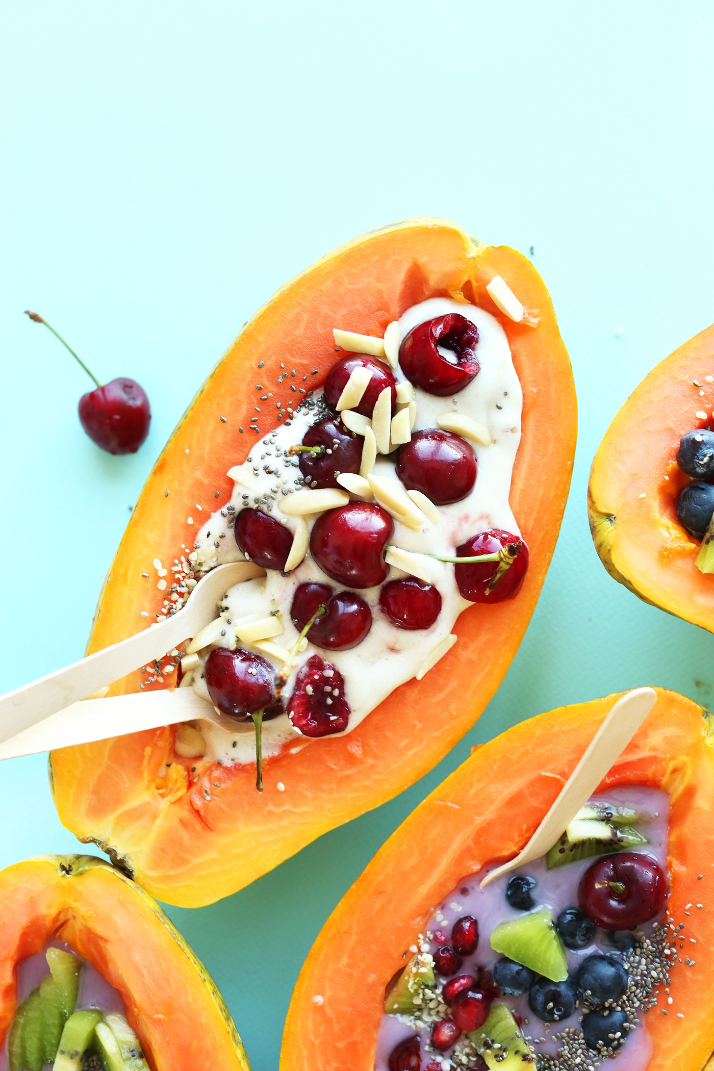 Papaya Boats with delicious summer toppings for a gluten-free vegan snack