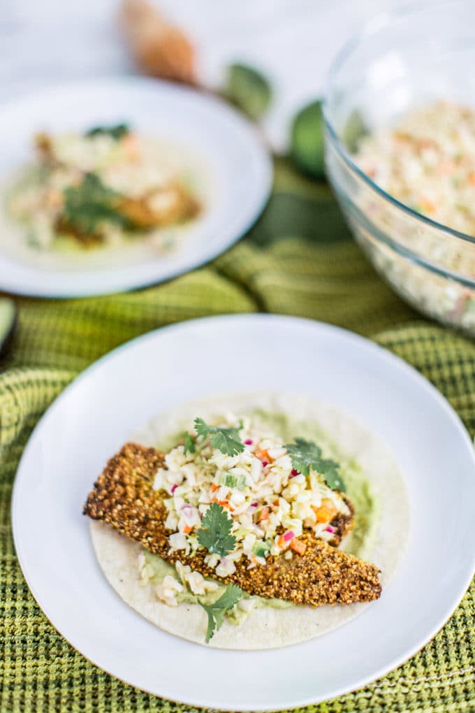 Crispy, crunchy and savory baja fish tacos that are also healthy and gluten free? Yes! It IS possible to make lightened up, real food fried tacos that make for a perfect summer meal. In this recipe, we