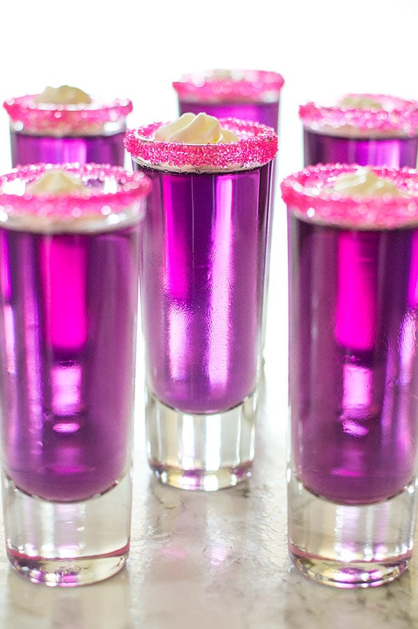 Jello shots with a major flavor upgrade. Candy-sweet and topped with triple sec whipped cream, you