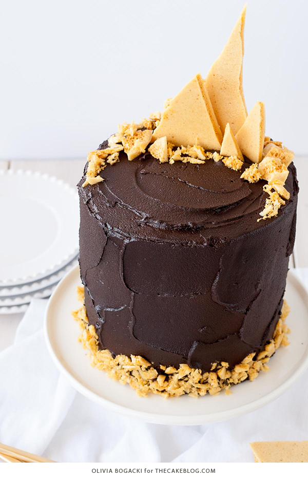 Dark Chocolate Honeycomb Cake - a rich chocolate layer cake recipe with ultra dark, fudgy frosting and homemade honeycomb | by Olivia Bogacki for TheCakeBlog.com