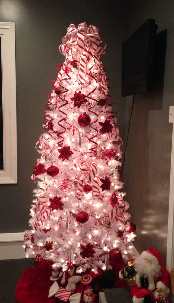 Candy Cane Christmas Tree Decorations
 25 best ideas about Poinsettia Tree on Pinterest
