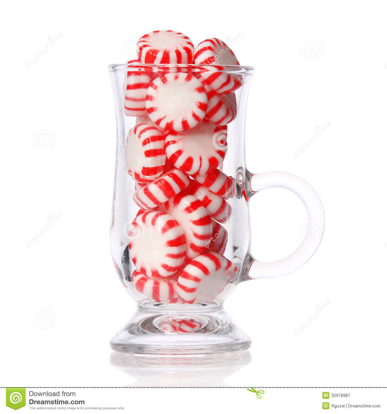 Christmas Mint Candy
 Peppermint Candy In Glass Isolated White Red Striped