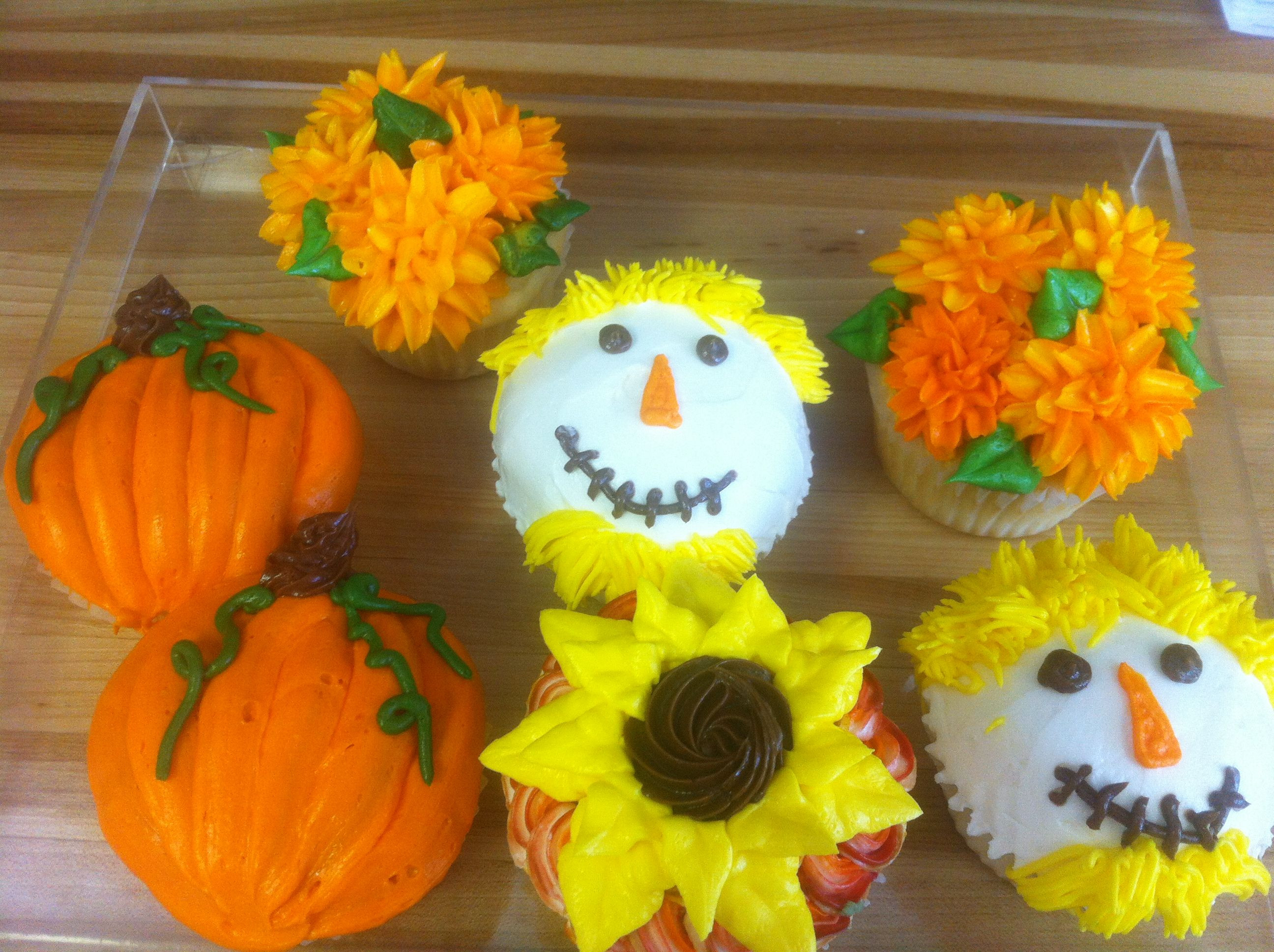 Fall Themed Cupcakes
 Fall themed cupcakes pumpkin scarecrow