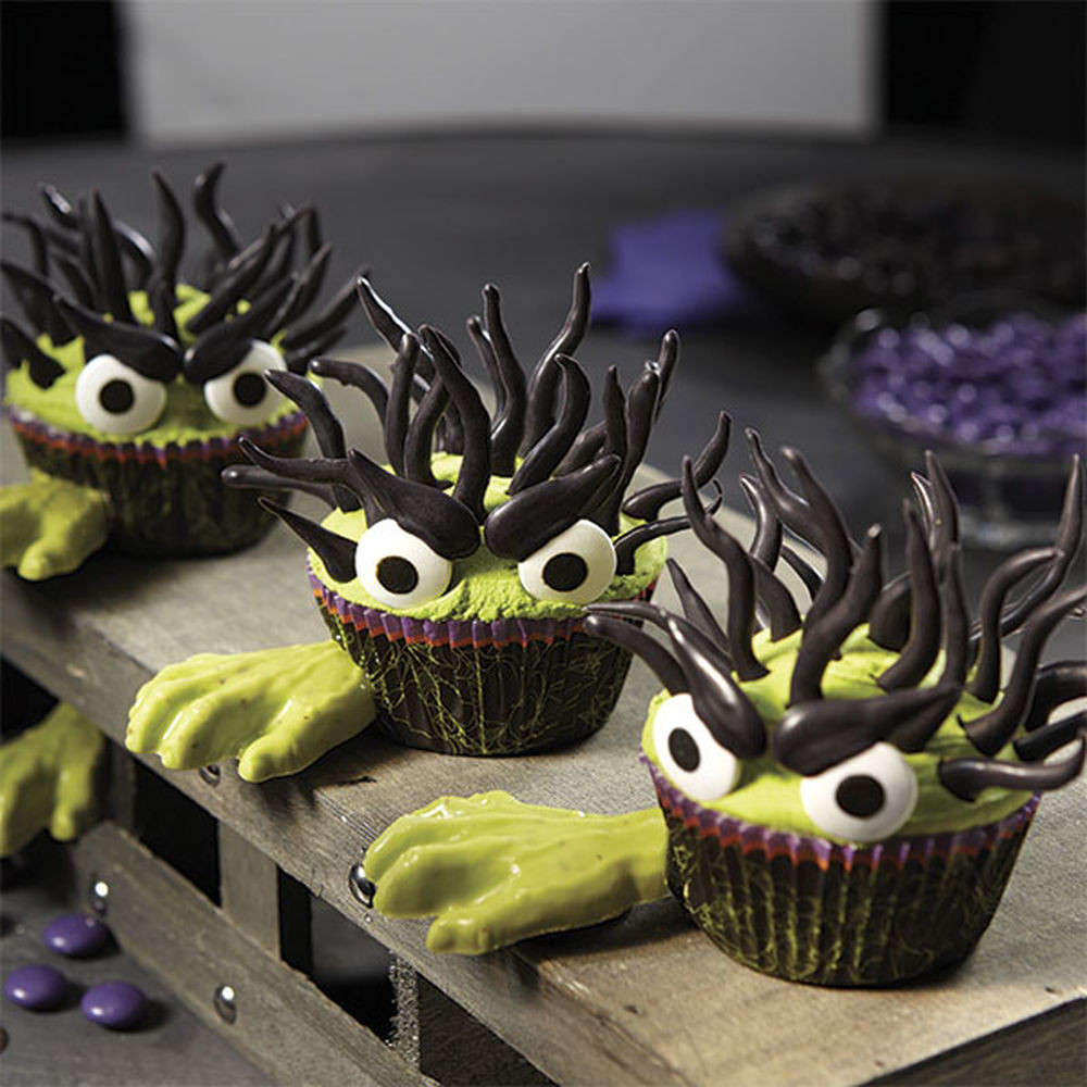 Halloween Monster Cupcakes
 Halloween Monster Cupcakes With Candy Hands