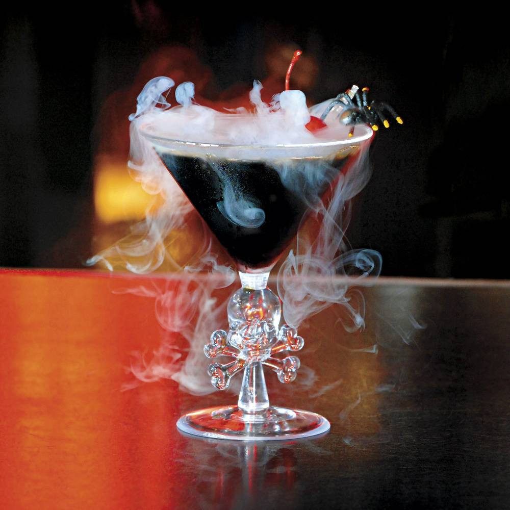 Halloween Themed Alcoholic Drinks
 Trick or treat Tabu’s Black Magic Martini is better than