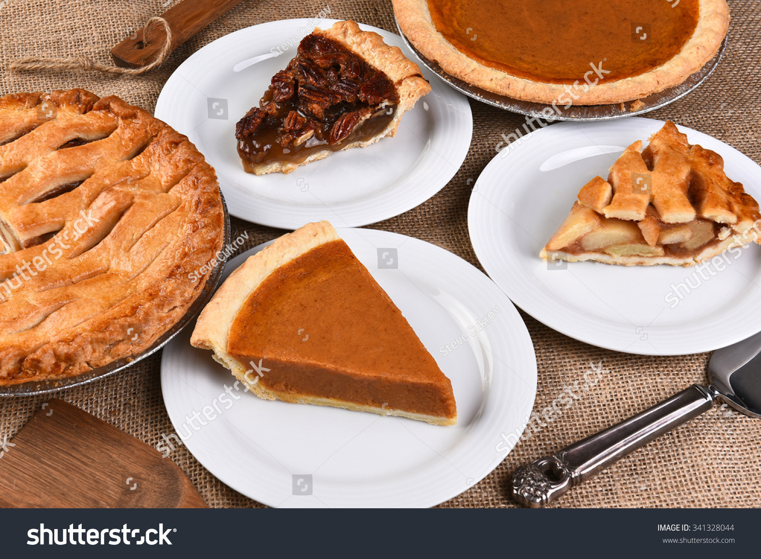 Traditional Thanksgiving Pies
 Cut Slices Traditional Thanksgiving Desserts Pecan Stock