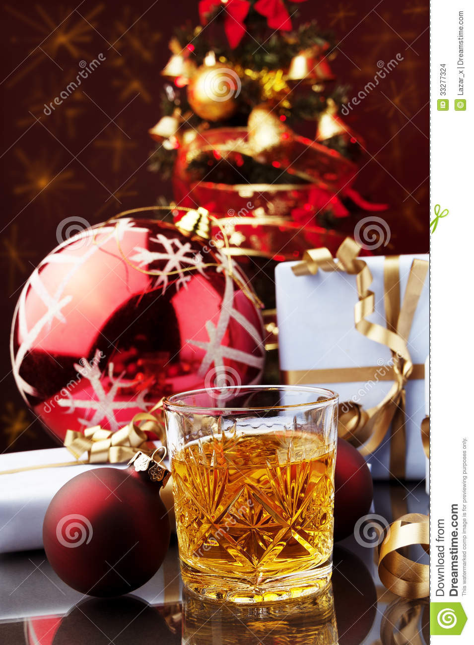 Whiskey Christmas Drinks
 Stock Christmas time and glass of whiskey Image